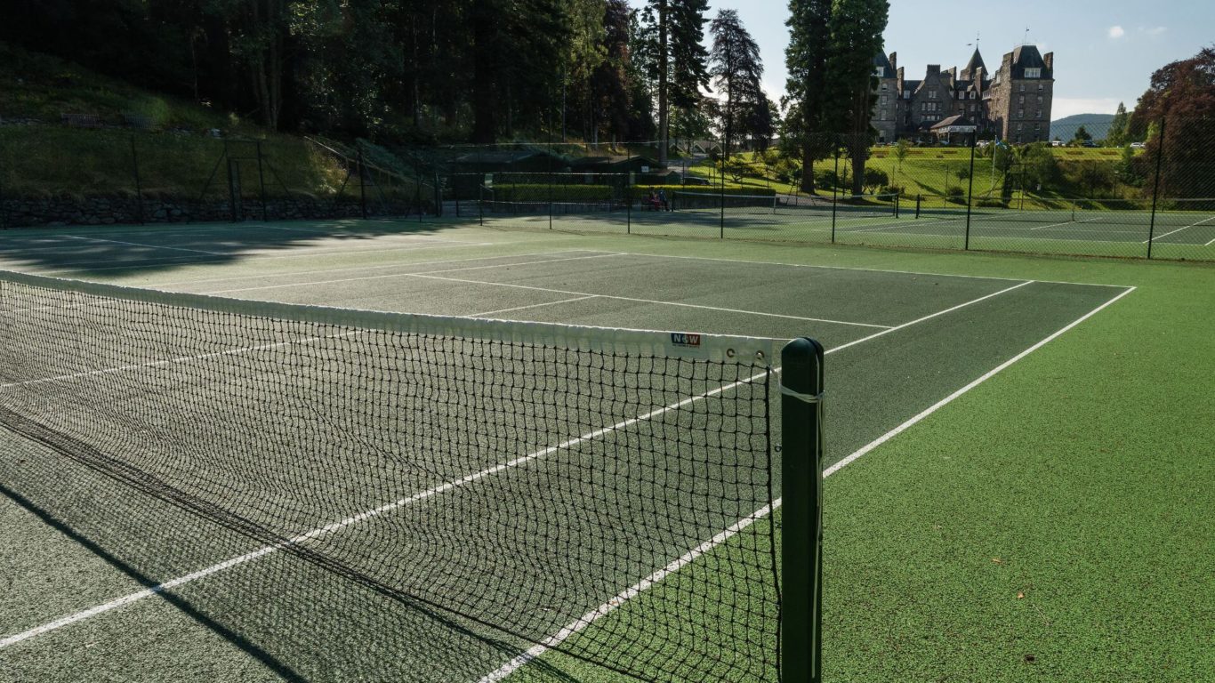 Tennis Court with Hotel
